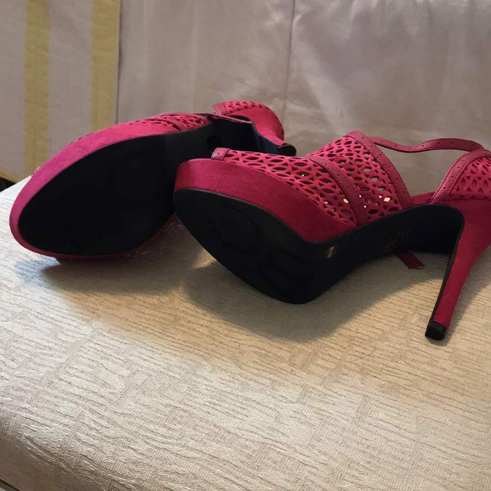 Never worn raspberry heels. Sued